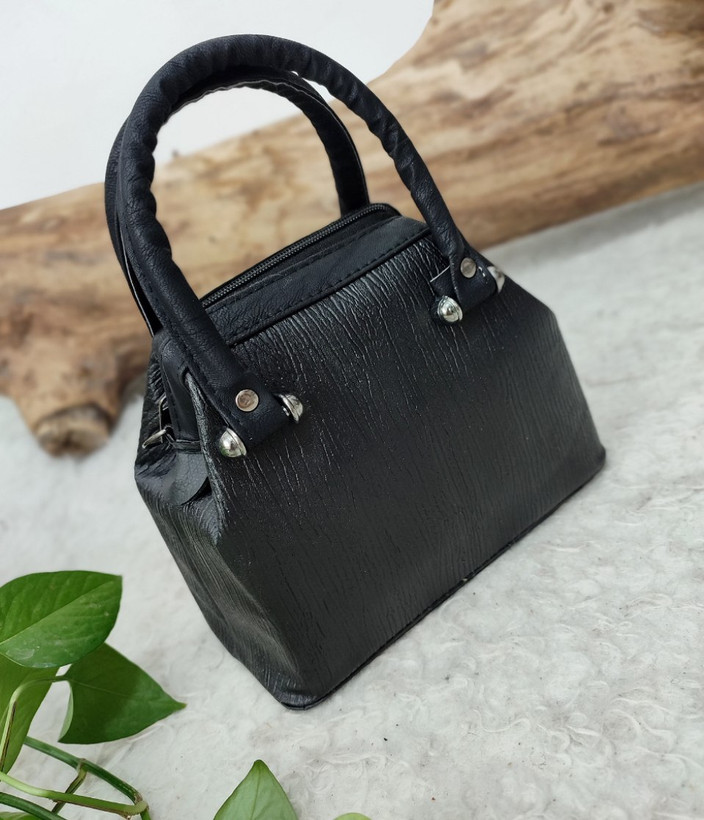 خرید و مشاهده قیمت کیف مجلسی مدل صدف کد 100340